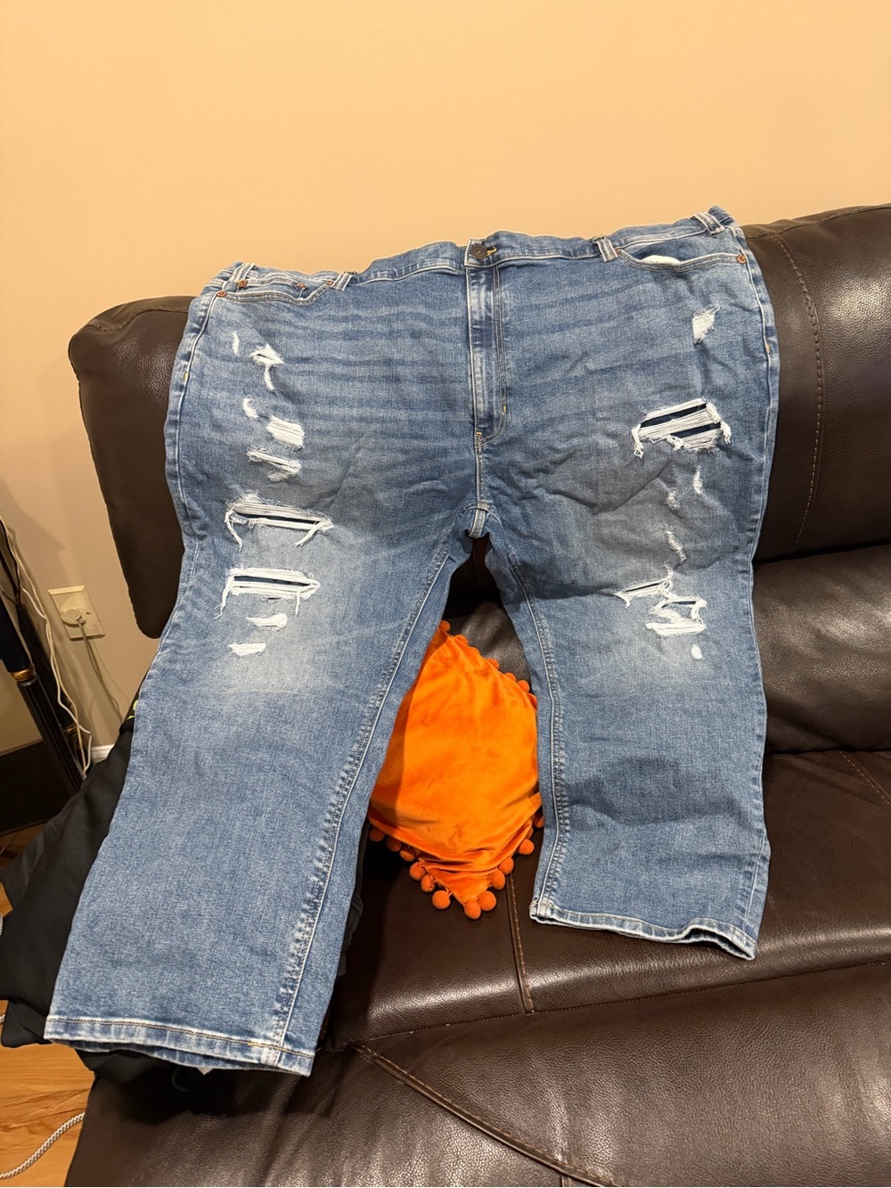 Relaxed Fit Distressed Denim Jeans in Light Blue